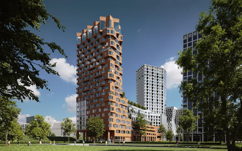 Een parkje met aan het einde en centraal in het midden een complex geschikt voor woningen, retail en kantoren