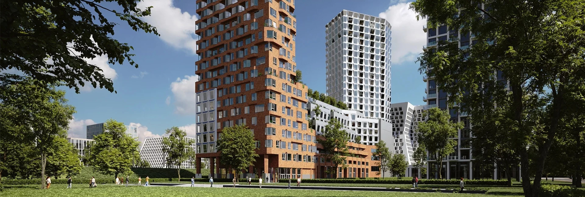 Een park met aan het einde en centraal in het midden een groot complex dat geschikt is voor woningen, retail en kantoren